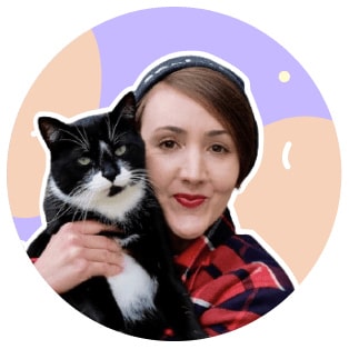 Scrimba team member Leanne and her tuxedo cat, Pumpkin